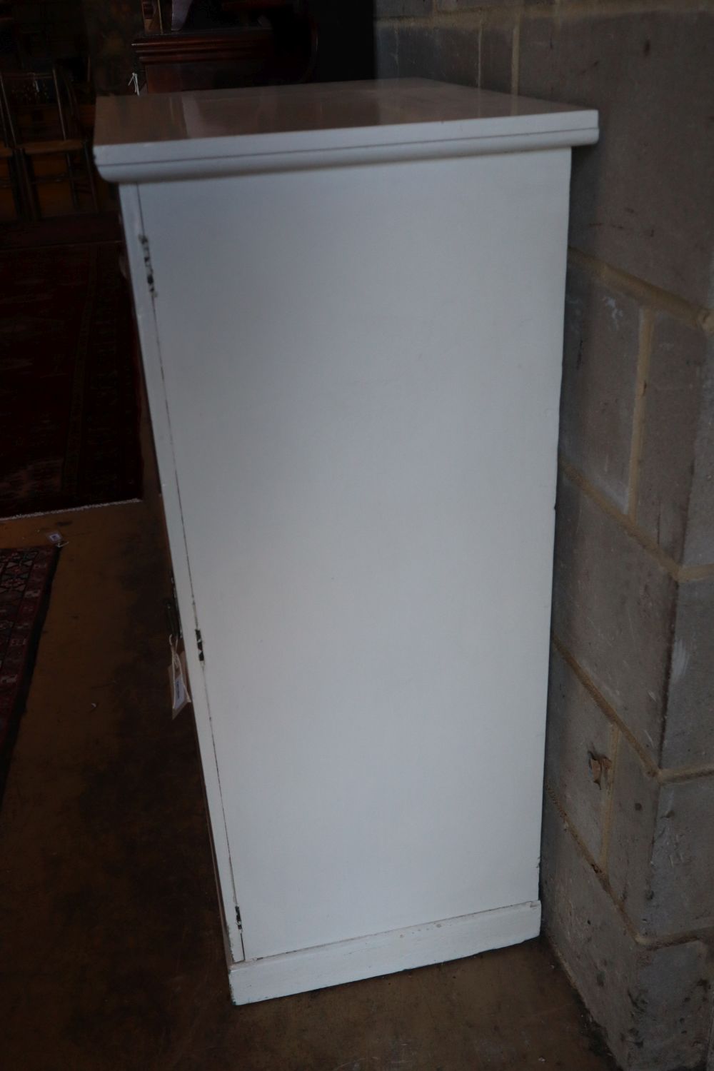 A painted Wellington chest, width 61cm, depth 45cm, height 107cm